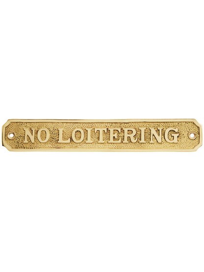 Cast Brass No Loitering Sign in Polished Brass.